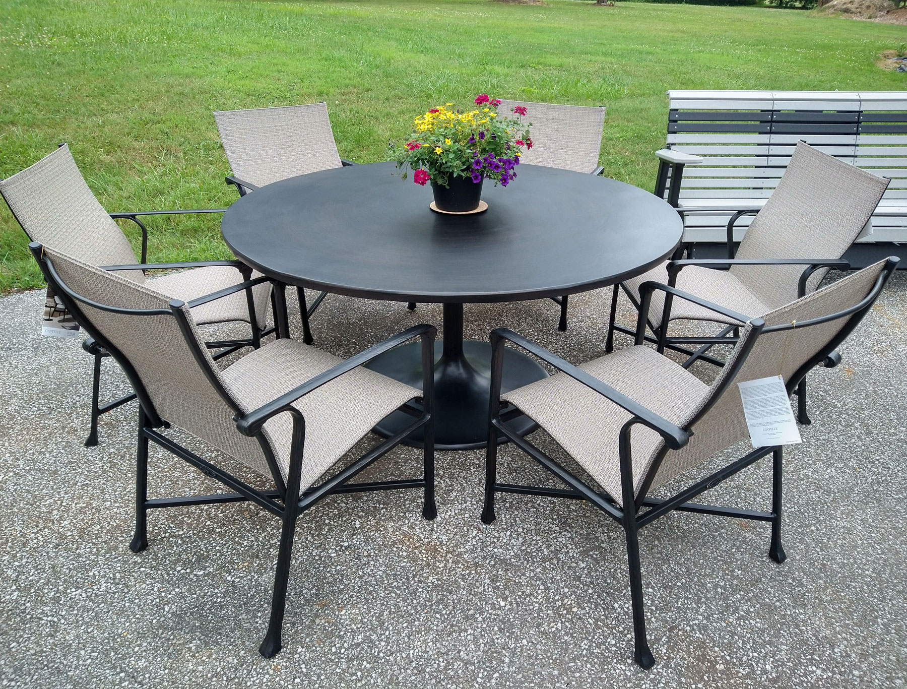 Castelle 60 inch Round Tulip Dining Table with (6) Marquis Sling Chairs